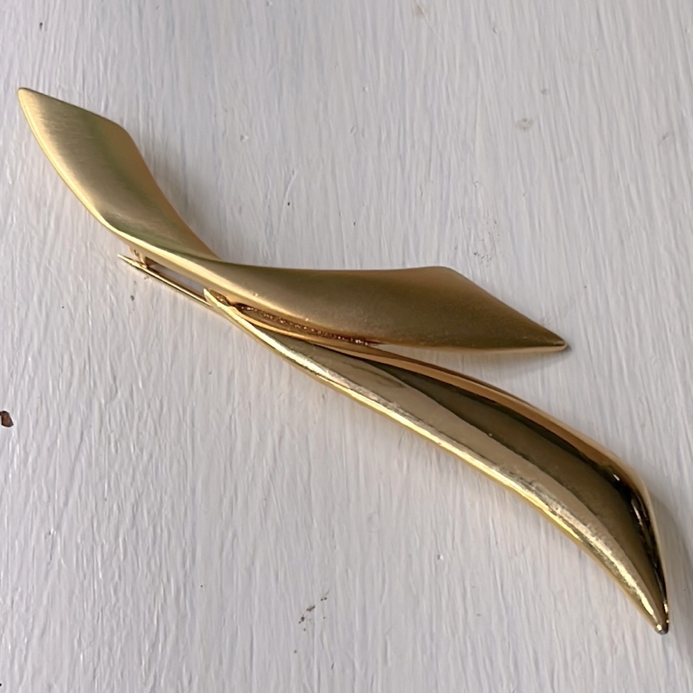 Tara gold toned brooch